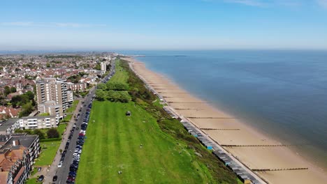 Flying-drone-shot-showing-clear-blue-sky-above-Fronton-on-Sea-in-Essex,-UK