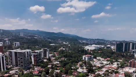 Aerial-hyperlapse-flying-over-the-cityscape-skyline-of-Guatemala-City