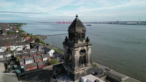 Wallasey-Town-Hall-iconic-landmark---aerial-drone-anti-clockwise-rotate-around-tower-from-close,-Wirral,-UK