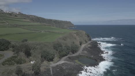 Natural-pools-along-rocky-coast-of-Santo-Antonio,-Sao-Miguel-of-Azores-islands