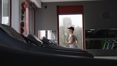 Professional-athlete-run-on-indoor-gym-treadmill-machine,-fitness-motivation