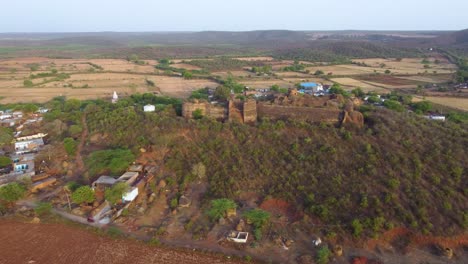 Aerial-drone-shot-of-an-Ancient-Indian-fort-or-castle-in-a-rural-village-of-Gwalior-Madhya-Pradesh-of-India