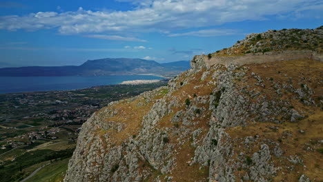 Acrocorinth-medieval-castle-walls-near-ancient-city-of-Corinth,-Greece-aerial