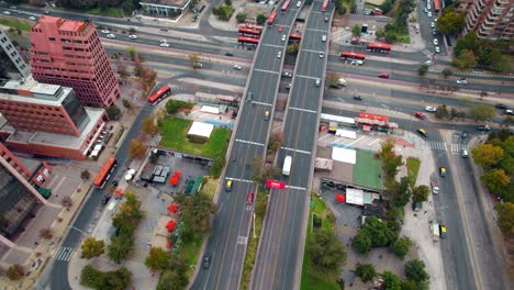 Aerial-drone-top-down-junction-avenue-intersection-in-bustling-Santiago-de-Chile