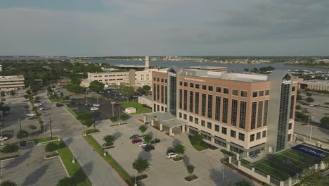 An-aerial-half-orbit-view-of-Houston-Methodist-Clear-Lake-Hospital,-Houston-Methodist-Orthopedics-and-Sports-Medicine,-Medical-Office-Building-4,-on-NASA-Road-1-in-Houston,-Texas