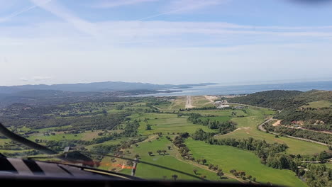 POV-Of-An-Airplane-Landing-Over-The-Runway-Of-Ajaccio-Napoleon-Bonaparte-Airport-In-France