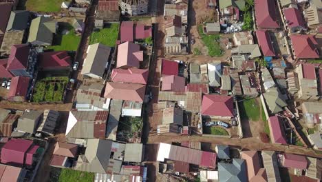 Birds-eye-view-of-the-street-and-housing-surroundings-in-Bukasa,-Kampala