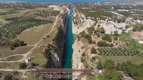 Panoramic-View-Of-The-Narrow-Man-Made-Canal-Of-Corinth-In-Isthmus,-Ionian-Sea,-Greece