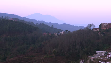 A-panning-view-of-the-rolling-foothills-in-the-Himalayan-Mountains-of-Nepal-in-the-blue-hour