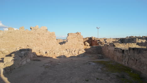 Broad-perspective-of-extensive-archaeological-ruins-at-Kato-Pafos-under-a-vibrant-sky,-showcasing-the-vastness-of-the-site---historical-place-in-Cyprus