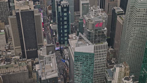 NYC-New-York-Aerial-v230-birds-eye-view-drone-flyover-Midtown-Manhattan-commercial-district-capturing-iconic-cityscape-of-Times-Square-with-flashy-billboard---Shot-with-Inspire-3-8k---September-2023