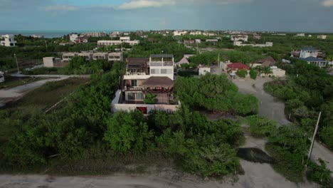 Pan-shot-of-Atenea-Holbox-hotel-in-Spain-with-greenery-landscape-at-background