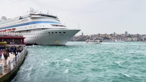 Big-Cruise-Ship-at-Harbor-on-Bosporus-Strait-in-Istanbul-with-Wavy-Sea