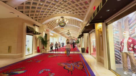 People-Walking-Through-The-Hallway-At-The-Wynn-Las-Vegas,-Five-Star-Luxury-Hotel-And-Casino-In-Nevada,-USA