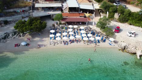 Aerial-Tilt-over-Ilylic-Afteli-Beach-Seashore,-Lefkada,-Greece