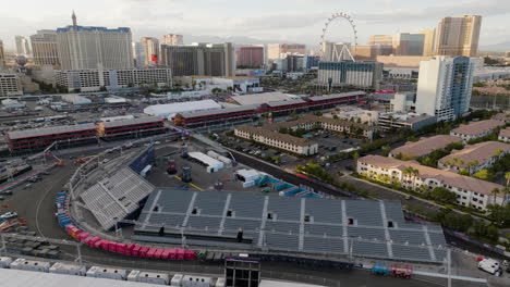 Aerial-view-rotating-over-the-quiet-F1-Grand-Prix-area,-sunrise-in-Las-Vegas,-USA