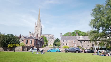 View-of-Norwich-cathedral-spire-over-recreational-park-field