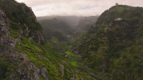 Drone-flight-over-the-mountain-valley-in-Madeira-Portugal