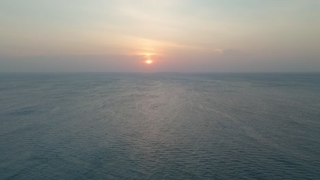 Sunset-on-the-Horizon-of-the-Indian-Ocean-in-Tanzania,-Africa,-Aerial