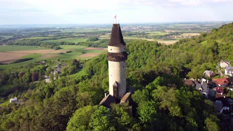 Orbit-Drone-Shot-of-the-historical-tower-City-of-Stramberk,-Czech-Republic-on-a-sunny-day