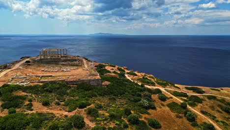 Aerial-View,-Temple-of-Poseidon-Ruin-in-Archaeological-Site-of-Sounion,-Greece-on-Sunny-Day