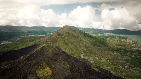 Volcanic-craters,-mountain-summits,-rugged-environment,-lava-terrain