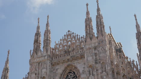 Gothic-spires-of-Milan-Cathedral-against-blue-sky-in-Milan