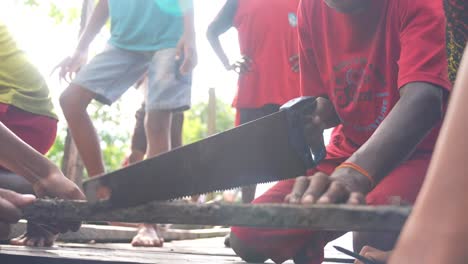 Teamwork-native-Papuan-tribe-children-working-together-Indonesia-Asia