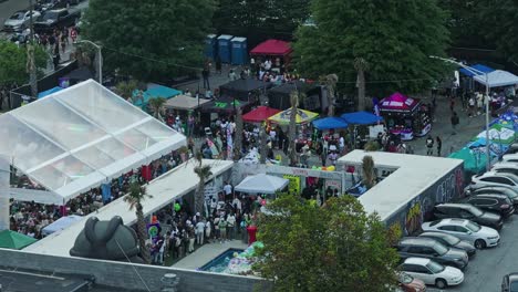 A-Large-Number-of-People-Erected-Tents-and-Filled-the-Streets-Forming-a-Bustling-Crowd-During-the-Fair-City-Event-in-Downtown-Atlanta,-Georgia,-USA---Wide-Shot