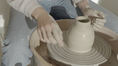 A-female-ceramicist-working-on-the-wheel