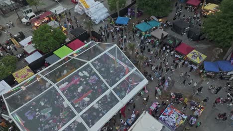 A-Throng-of-Individuals-With-Tents-Fills-the-Street-at-the-Fair-City-Event-in-Downtown-Atlanta,-Georgia,-USA---Orbit-Drone-Shot