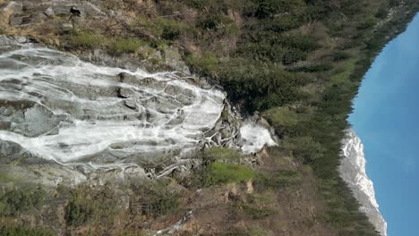 Drone-flying-toward-Nardis-Waterfall,-Trentino,-Italian-Alps,-Italy
