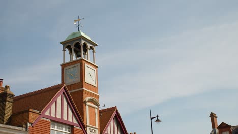 Clock-tower-on-village-street-on-a-summers-day