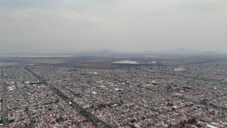 Elevated-view-of-the-airport-area-in-Mexico-City,-cloudy-day