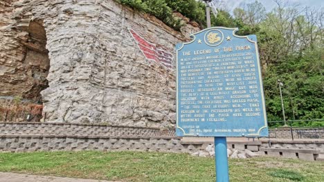 The-Legend-of-the-Piasa-Mural-Painted-on-Limestone-Cliffs-Along-the-Mississippi-Road,-Alton,-Illinois,-USA