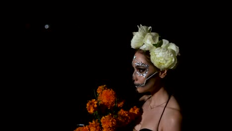 Mexican-model-in-catrina-costume,-walking-trough-the-night