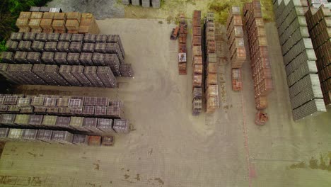 Aerial-View-of-Stacks-of-Pavers-and-Slabs,-Permeable-and-Driveway-Pavers