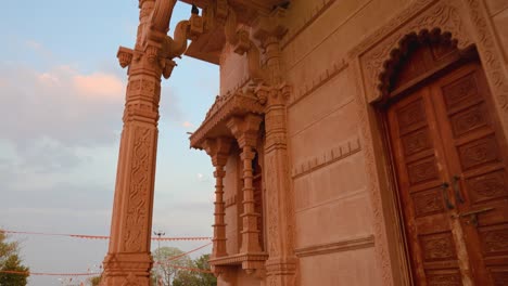 artistic-hindu-temple-with-dramatic-sunset-sky-at-evening-from-unique-perspective