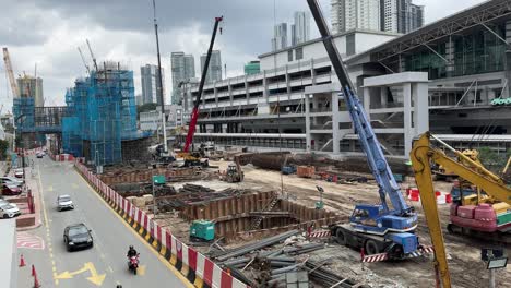 Ongoing-construction-site-outside-Johor-Bahru-Sentral-Station-and-JB-City-Square,-a-shopping-mall-in-Johor,-Malaysia