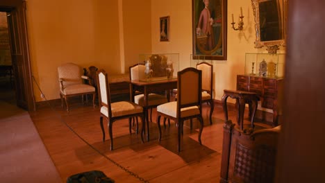 Rococo-dining-room-with-elegant-furniture-and-portrait-in-Trakoscan-Castle,-Croatia