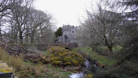 Scenic-view-within-Lews-Castle-grounds-and-gardens-with-running-stream-of-water-in-Stornoway,-Outer-Hebrides-of-Scotland-UK