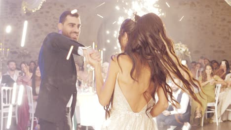 Slow-motion-shot-of-a-newly-married-couple-finishing-their-first-dance