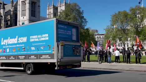 The-GMB-union-advocating-for-workers'-rights-amidst-the-historic-Parliament-Square-Garden