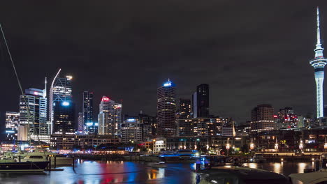 Auckland,-New-Zealand-skyline,-marina-at-night,-static-timelapse