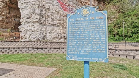 The-Legend-of-the-Piasa-Mural-Painted-on-Limestone-Cliffs-Along-the-Mississippi-Road,-Alton,-Illinois,-USA