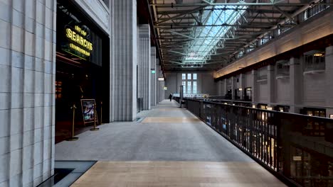 POV-Walking-Along-Upper-Level-Of-The-Turbine-Hall-At-Battersea-Power-Station-Building