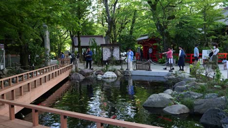 Tourists-and-local-mingle-at-local-shrine-in-the-city-center