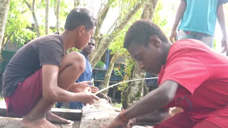 Children-playing-together-working-on-school-project-undeveloped-area