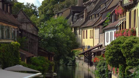 Colmar-Little-Venice-district-in-the-old-town-gathers-colourful-half-timbered-houses-neatly-lining-cobblestone-streets-and-walkways