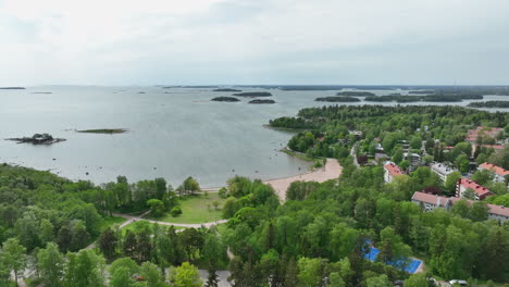 Aerial-view-around-the-Kasinonranta-beach,-summer-in-Lauttasaari,-Finland